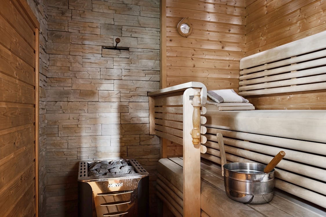 Basement indoor sauna installation with cedar interior